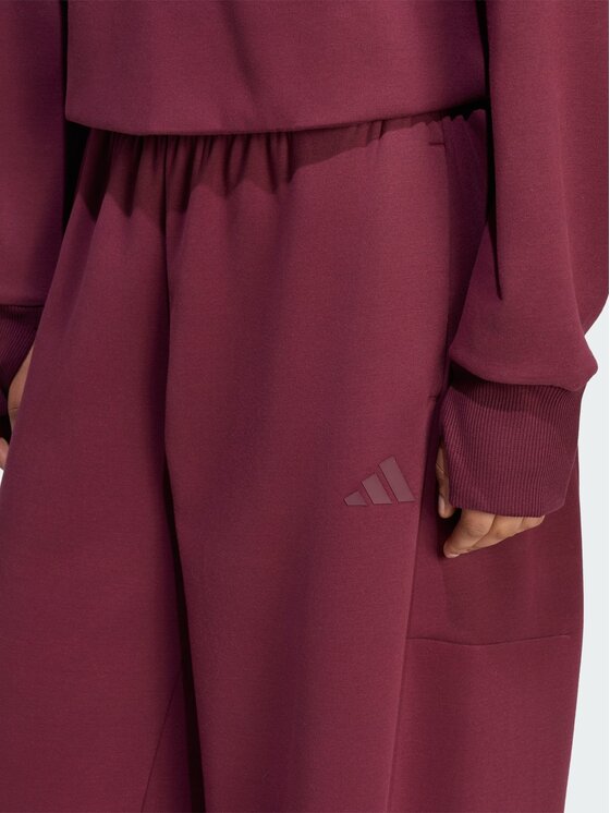 adidas adidas Spodnie materiałowe 169853 Czerwony Loose Fit