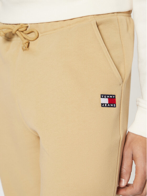 Tommy Jeans Tommy Jeans Spodnie dresowe Badge DM0DM20276 Beżowy Regular Fit