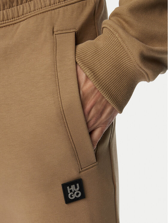 HUGO HUGO Spodnie dresowe Dimacs 50533695 Beżowy Relaxed Fit