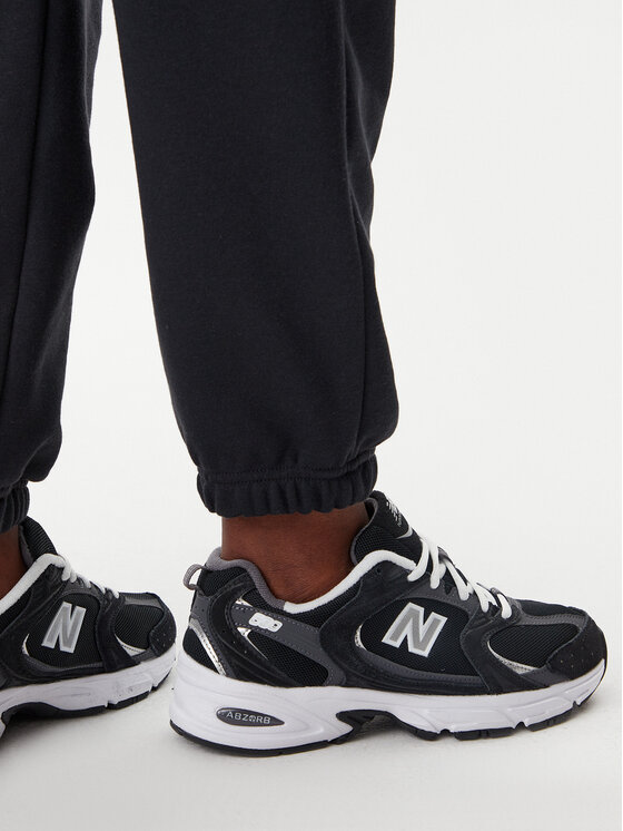 New Balance New Balance Долнище анцуг Essentials WP41500 Черен Relaxed Fit