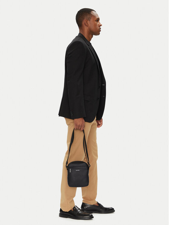 Calvin Klein Calvin Klein Crossover torbica Ck Must Reporter LV04D3083G Crna