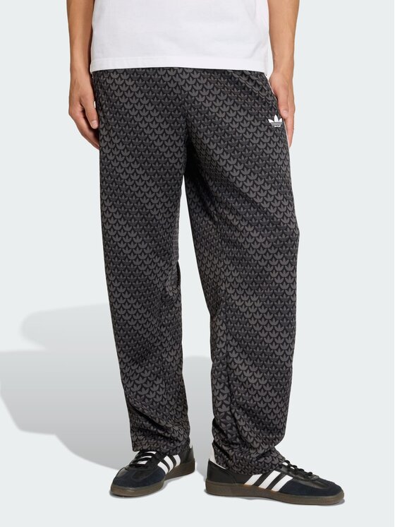 adidas adidas Spodnie dresowe Firebird loose monogram Czarny Regular Fit