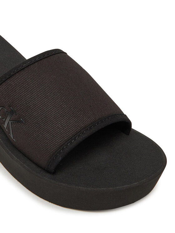 Calvin Klein Jeans Calvin Klein Jeans Шльопанці Beach Wedge Slide Canvas YW0YW01725 Чорний