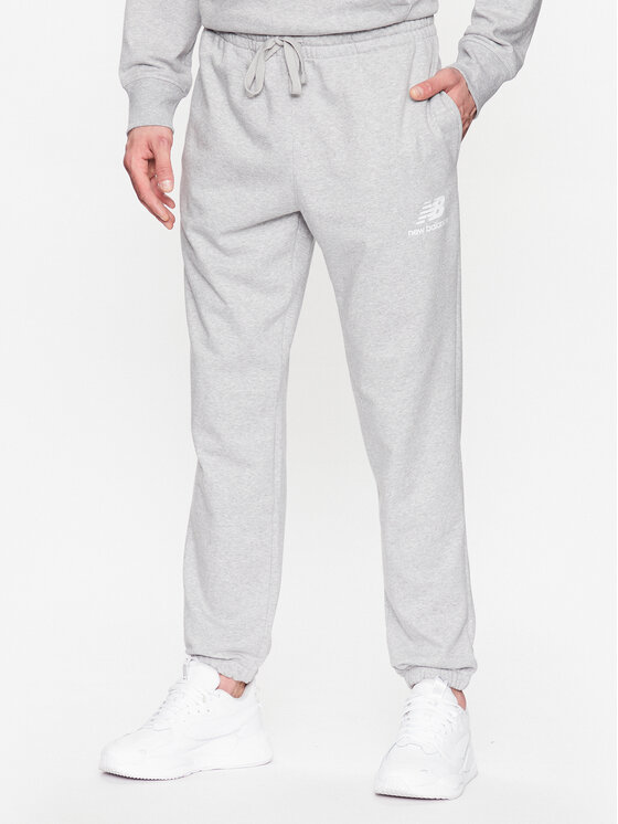 New Balance Teplákové nohavice MP31539 Sivá Regular Fit