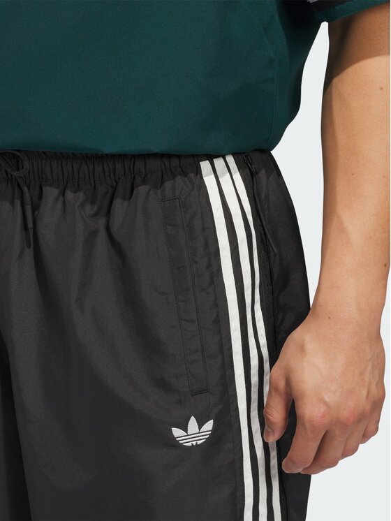 adidas adidas Spodnie materiałowe Basketball Windbreaker Czarny Loose Fit
