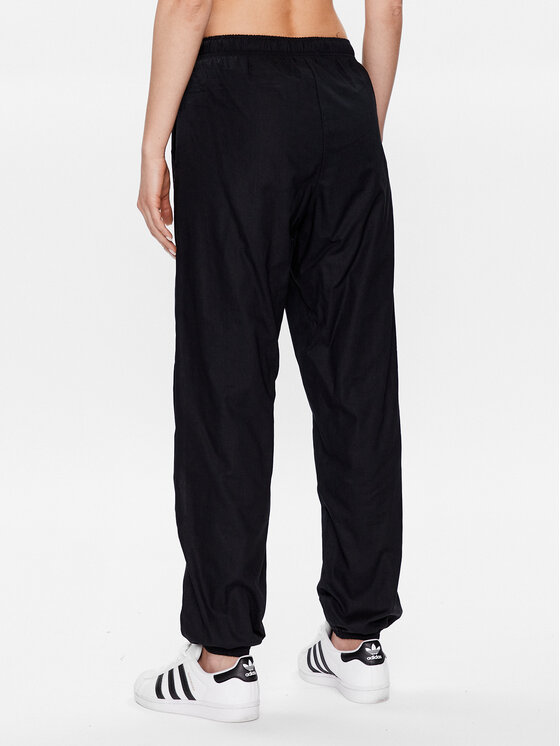 Champion Pantaloni da tuta 116077 Nero Regular Fit Modivo