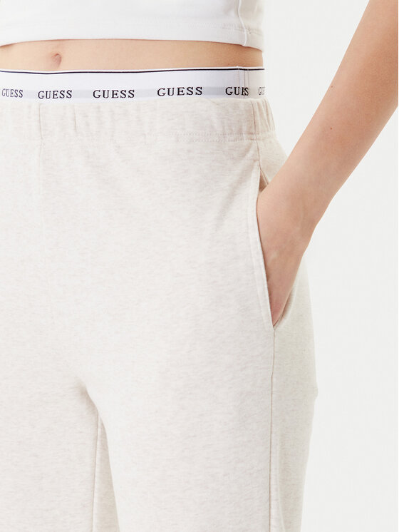 Guess Guess Spodnie dresowe O5RB01 KCO31 Beżowy Regular Fit