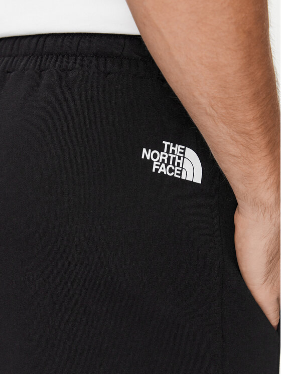 The North Face The North Face Spodnji del trenirke Standard NF0A4M7L Črna Regular Fit