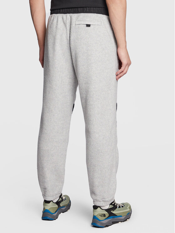 New Balance New Balance Spodnji del trenirke All Terrain Spinnex MP23509 Siva Relaxed Fit