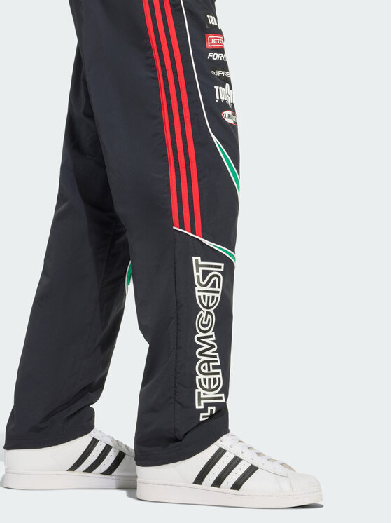 adidas adidas Spodnie dresowe TEAMGEIST MOTO Czarny Loose Fit