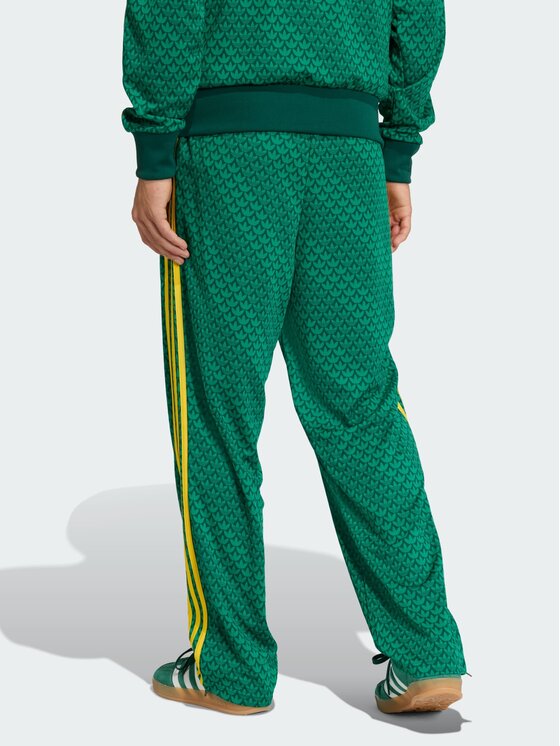 adidas adidas Spodnie dresowe Firebird loose monogram Zielony ciemny Regular Fit