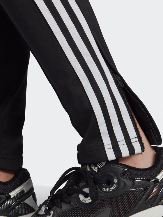 adidas adidas Spodnji del trenirke adicolor IB5916 Črna Slim Fit