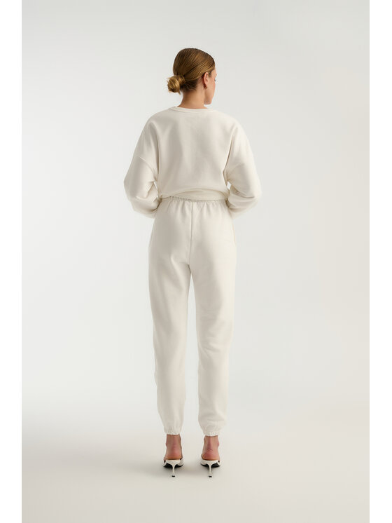TRIPLES TRIPLES Spodnie dresowe Teddy Off White Biały Straight Fit
