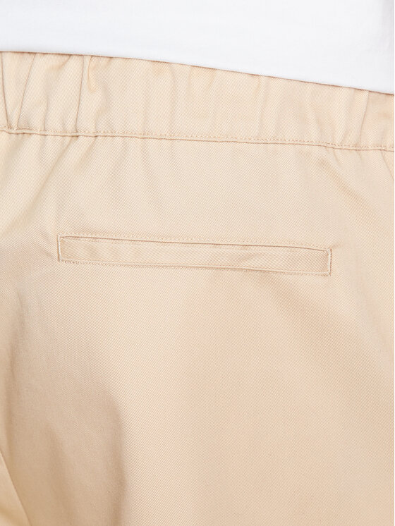 Champion Champion Pantaloncini di tessuto 217239 Beige Relaxed Fit