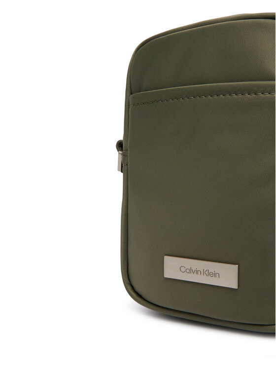Calvin Klein Calvin Klein Crossover torbica Sleek Slim Reporter LV04D3233G Zelena