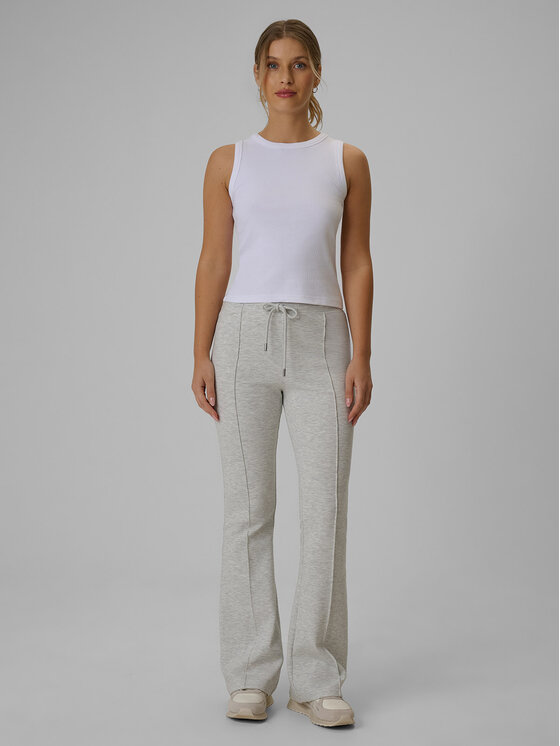 4F 4F Spodnie dresowe COSY Szary jasny Slim Fit