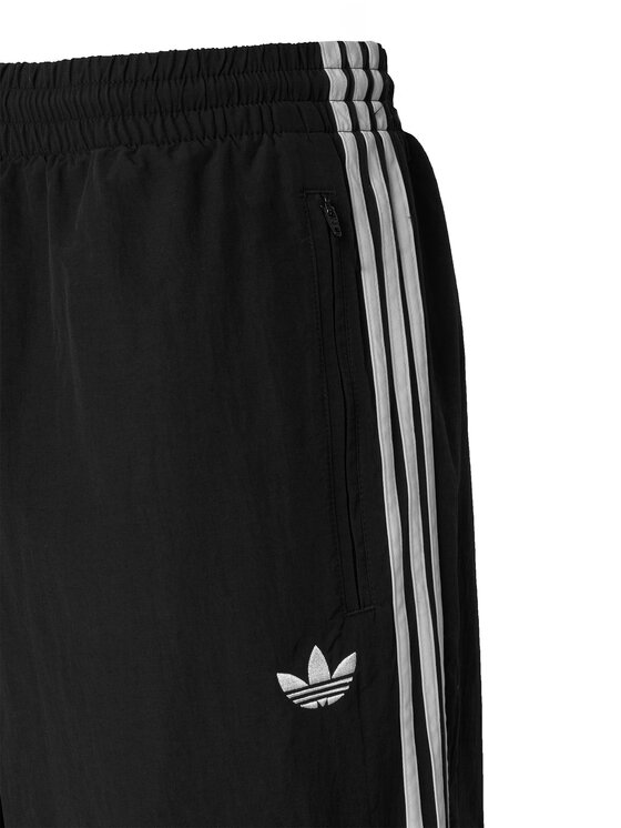 adidas adidas Spodnie dresowe Firebird Woven KE1371 Czarny Regular Fit