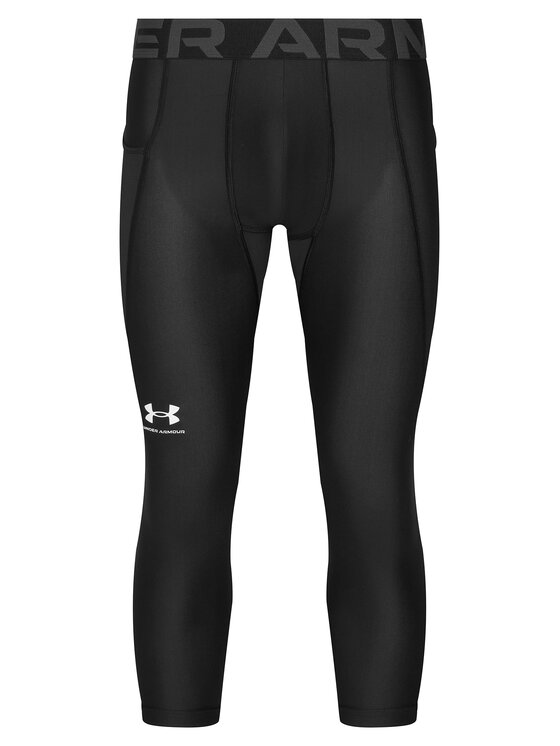 Legginsy sportowe widoczne z przodu na neutralnym tle.