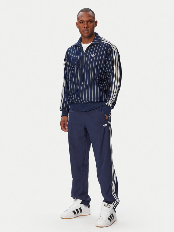 adidas adidas Долнище анцуг Firebird Woven KE1370 Тъмносин Regular Fit