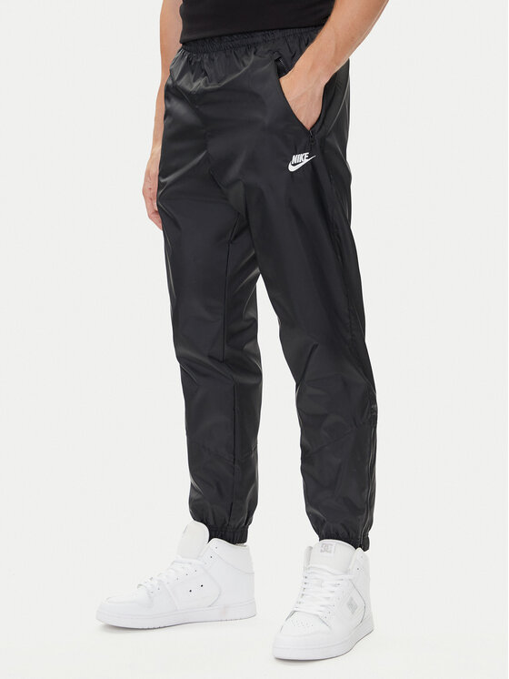 Nike Spodnie dresowe Windrunner DX0653 Czarny Standard Fit