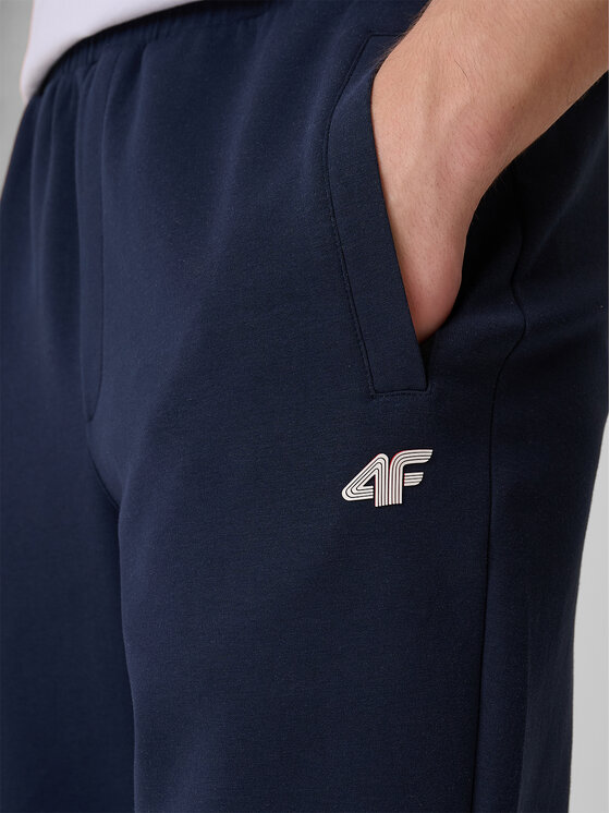 4F 4F Spodnie dresowe MONOCHROME MOVEMENT Granatowy Regular Fit