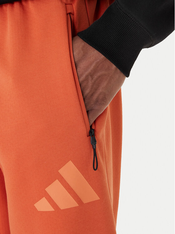 adidas adidas Долнище анцуг Z.N.E. KE4686 Оранжев Regular Fit