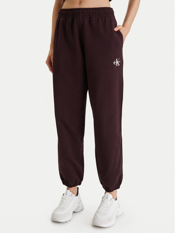 Calvin Klein Jeans Calvin Klein Jeans Spodnji del trenirke Monologo LV047B235G Rjava Regular Fit