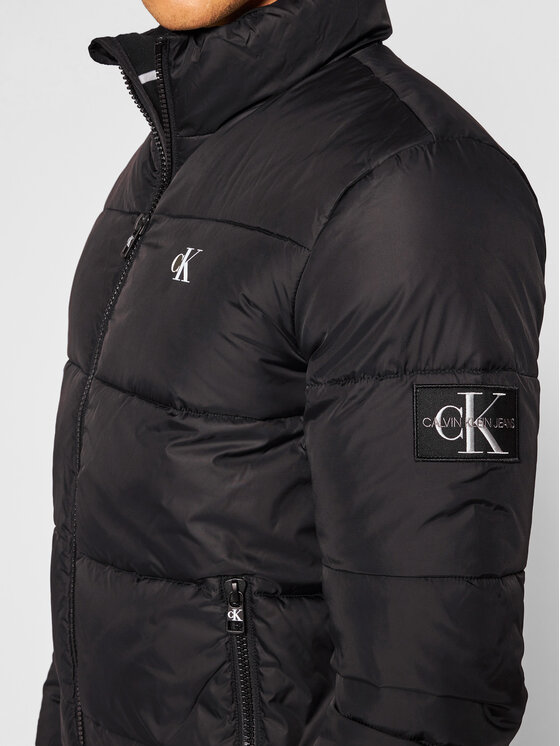 Calvin Klein Jeans Pūkinė striukė J30J316056 Juoda Regular Fit • Modivo.lt