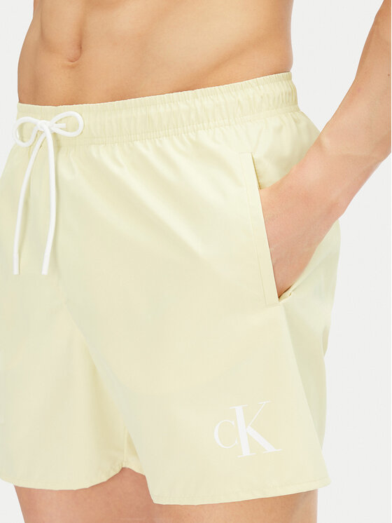 Calvin Klein Swimwear Calvin Klein Swimwear Kupaće gaće i hlače KM0KM01101 Žuta Regular Fit