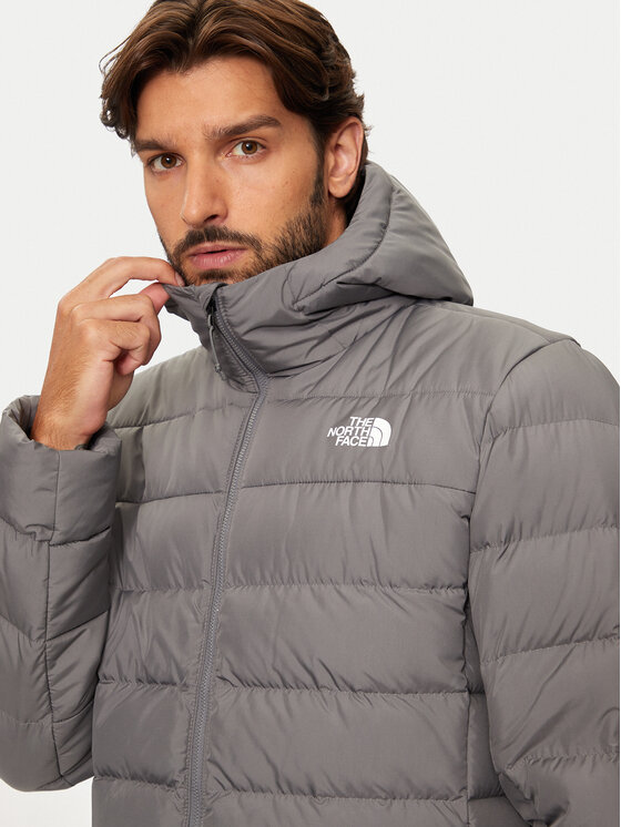 The North Face The North Face Vatovaná bunda Aconcaqua NF0A84I1 Sivá Regular Fit
