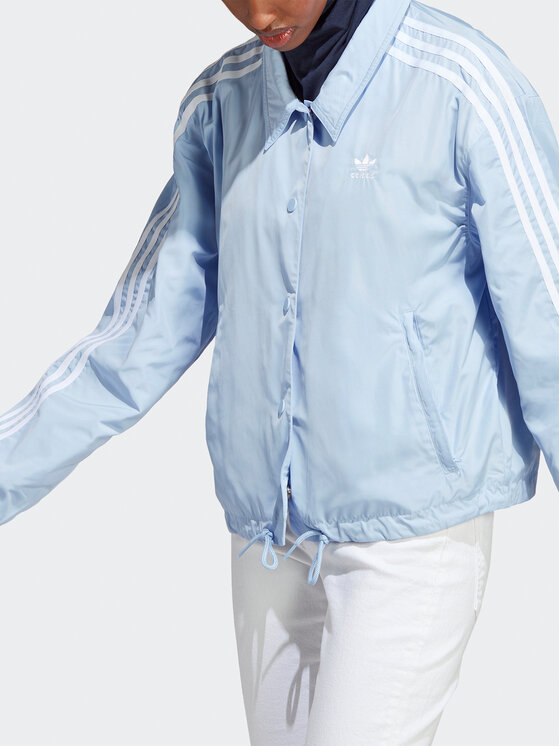adidas Giacca di transizione Adicolor Classics 3 Stripes Coach Jacket IC5480 Celeste Loose Fit