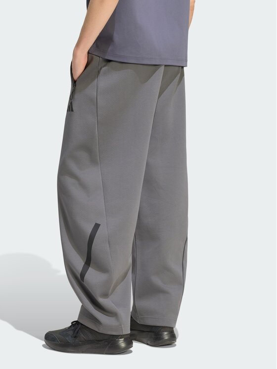 adidas adidas Pantaloni di tessuto Z.N.E. OPEN HEMZ.N.E. OPEN HEM Grigio Loose Fit