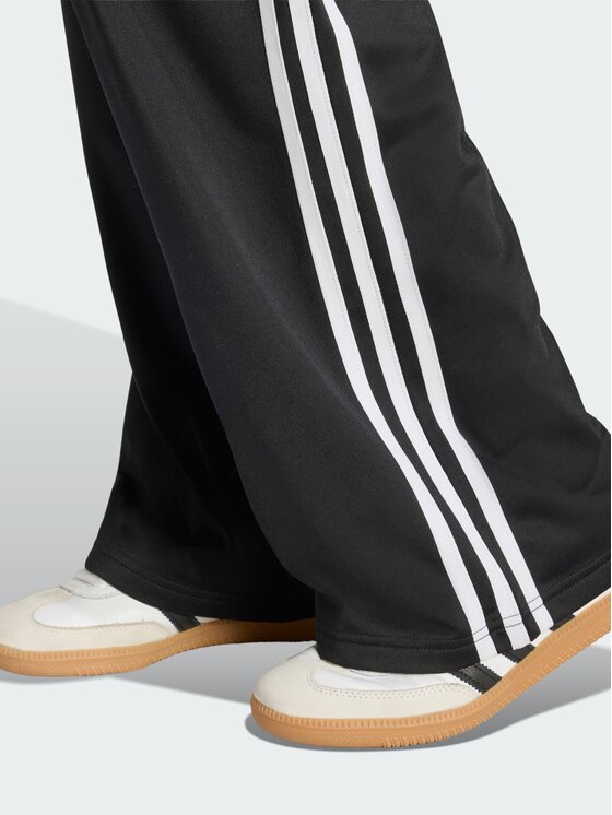 adidas adidas Spodnie dresowe Firebird Czarny Loose Fit