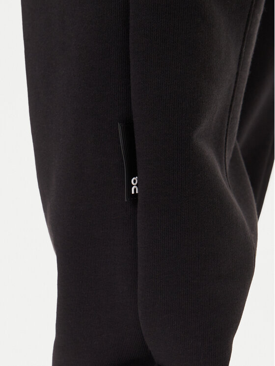 On On Donji dio trenerke Club Pants 1ME1004 Crna Relaxed Fit