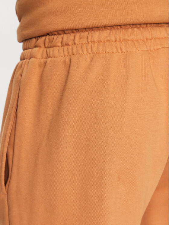 New Balance New Balance Долнище анцуг MP31539 Жълт Regular Fit