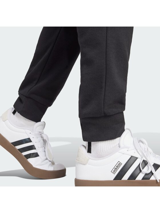 adidas adidas Spodnji del trenirke Essentials Feel Cozy JE3854 Črna Regular Fit