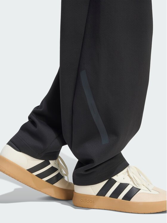 adidas adidas Spodnie materiałowe Z.N.E. OPEN HEMZ.N.E. OPEN HEM Czarny Loose Fit