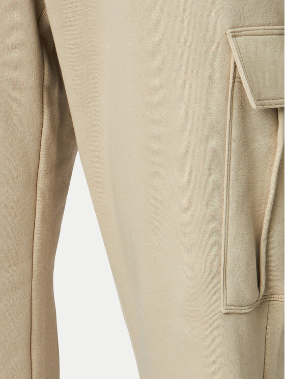 Champion Champion Pantaloni da tuta 117554 Beige Loose Fit