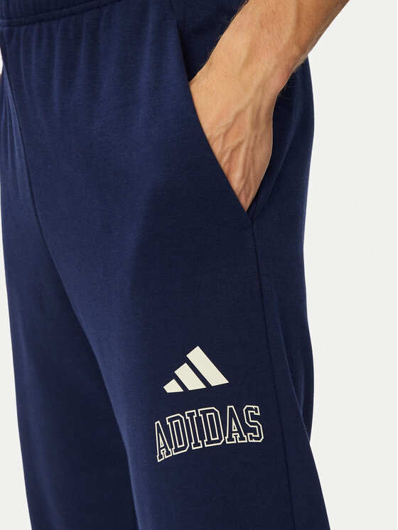 adidas adidas Спортивні штани Seasonal Essentials Collegiate French Terry Cuffed KG0521 Cиній Regular Fit