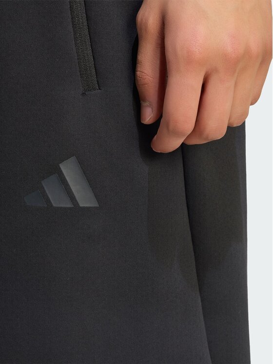 adidas adidas Spodnie materiałowe Z.N.E. OPEN HEMZ.N.E. OPEN HEM Czarny Loose Fit