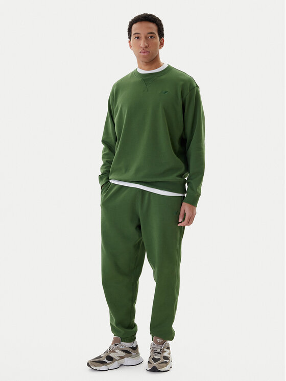 New Balance New Balance Spodnji del trenirke MP41508 Zelena Relaxed Fit