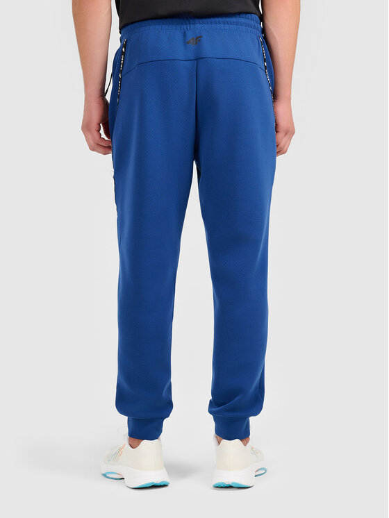 4F 4F Spodnie dresowe 4FWAW26TTROM1802-30S Granatowy Active Fit