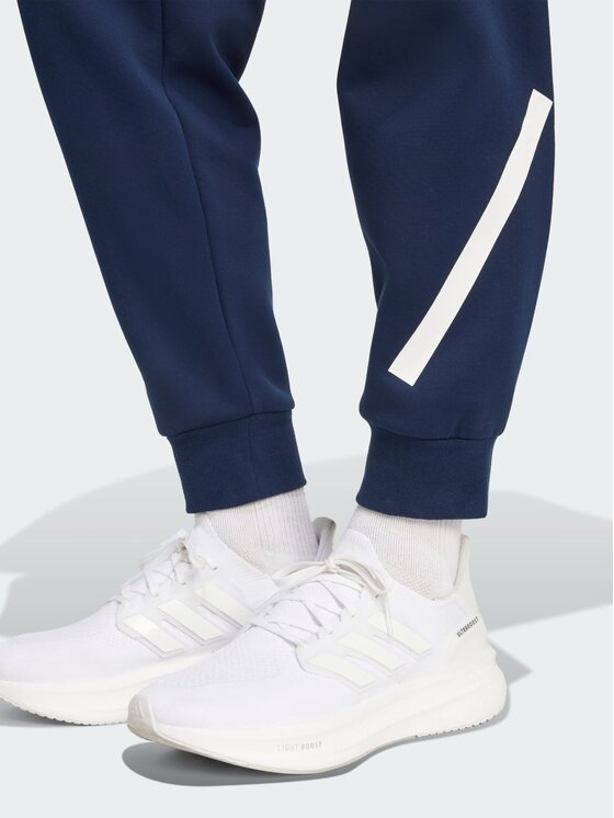 adidas adidas Spodnie materiałowe 151687 Błękitny Regular Fit