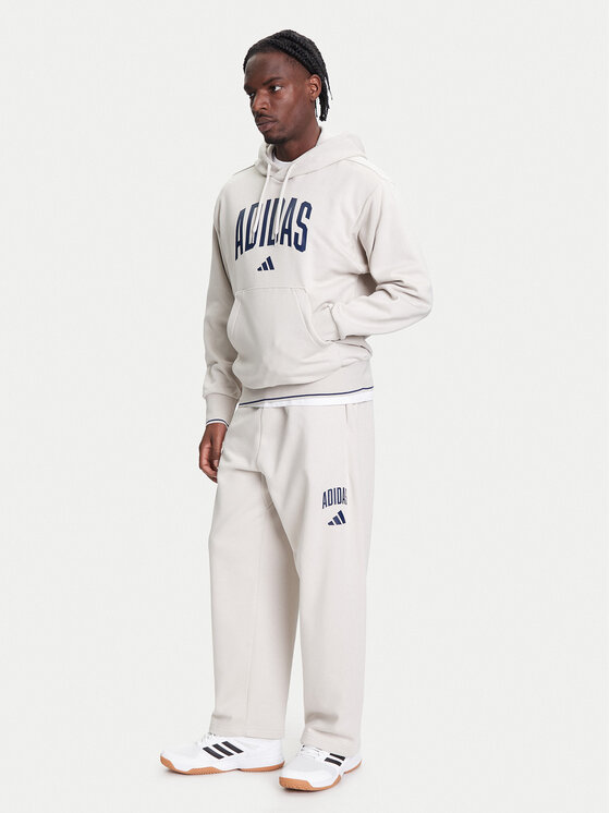 adidas adidas Spodnie dresowe Collegiate JM9177 Beżowy Regular Fit