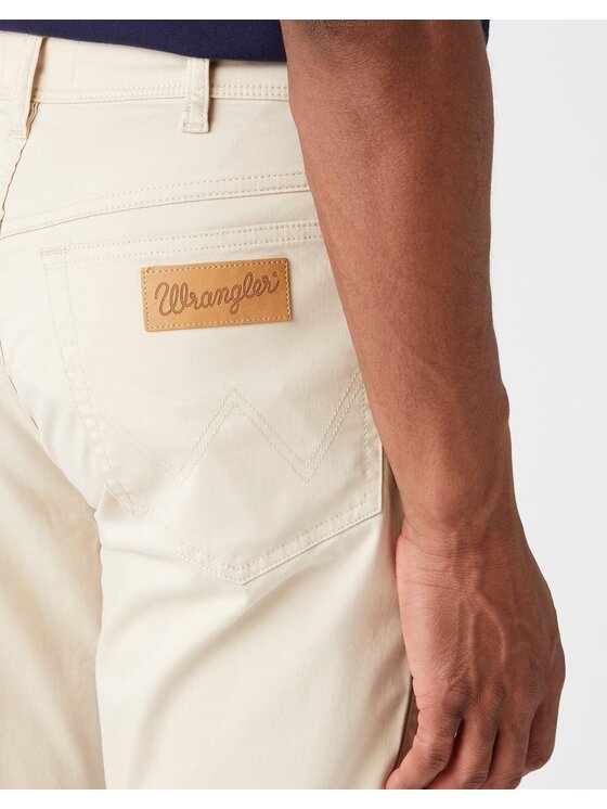 Wrangler Wrangler Spodnie materiałowe TEXAS SLIM Beżowy Slim Fit