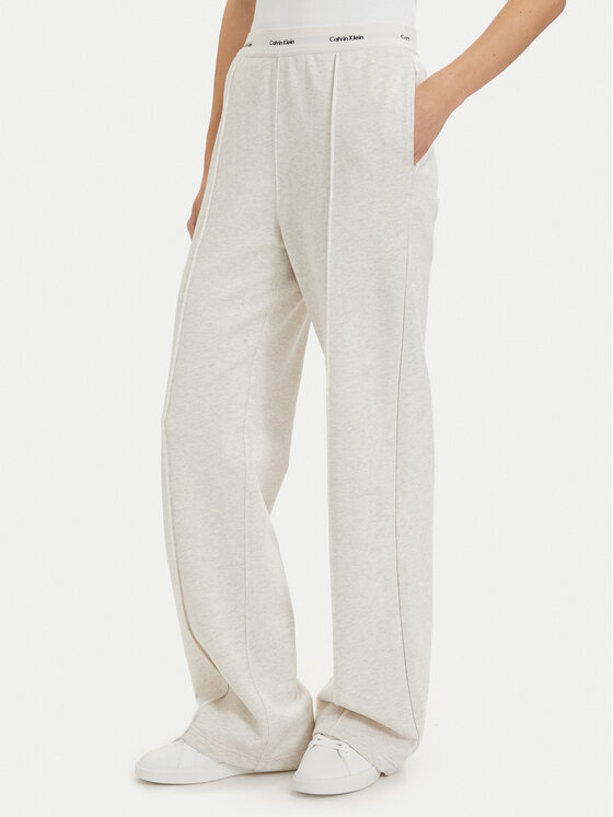 Calvin Klein Jeans Calvin Klein Jeans Spodnji del trenirke LV047G253G Kremna Relaxed Fit