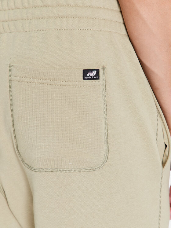 New Balance New Balance Spodnie dresowe NB Essentials Sweatpant MP33509 Zielony Regular Fit