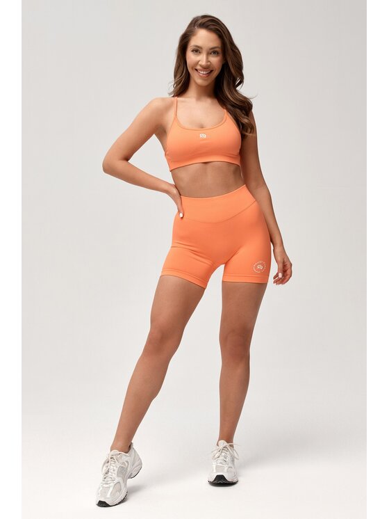 ROUGH RADICAL ROUGH RADICAL Pantaloncini sportivi SEAMLESS GLOW SHORTS Corallo Slim Fit