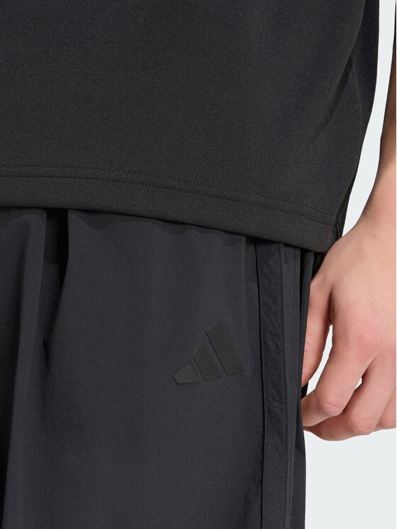 adidas adidas Spodnie materiałowe 164596 Czarny Loose Fit