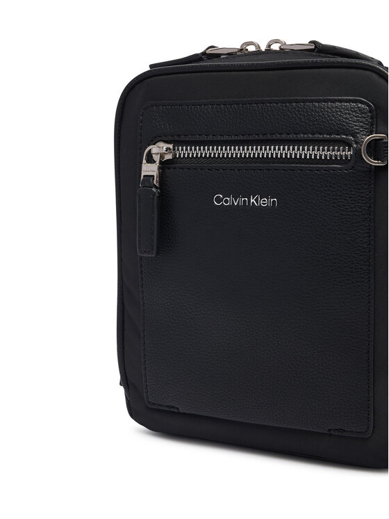 Calvin Klein Calvin Klein Crossover torbica Ssnl Raised Logo Reporter LV04D3500G Crna